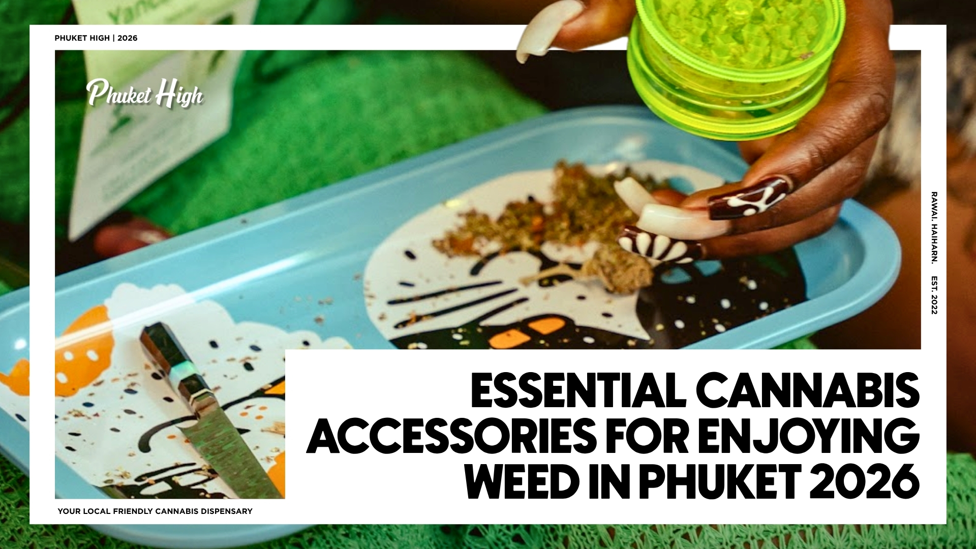 A photograph, framed by a white graphic border with various text elements, captures a close-up, top-down view of a person with intricately patterned nail art preparing ground cannabis. The person is holding a clear-green plastic grinder over a light-blue rolling tray, which features a whimsical black-and-white face design and contains some ground cannabis and a small knife. The background is a green textured knit fabric. The surrounding frame and the photo area contain the following text: Top-left (inside frame): "PHUKET HIGH | 2026" Top-left (inside photo, in script font): "Phuket High" with a small icon. Bottom-right (large bold block text): "ESSENTIAL CANNABIS ACCESSORIES FOR ENJOYING WEED IN PHUKET 2026" Bottom-left (inside frame): "YOUR LOCAL FRIENDLY CANNABIS DISPENSARY" Right-side (vertical text, inside frame): "RAWAI, THAILAND EST. 2022"