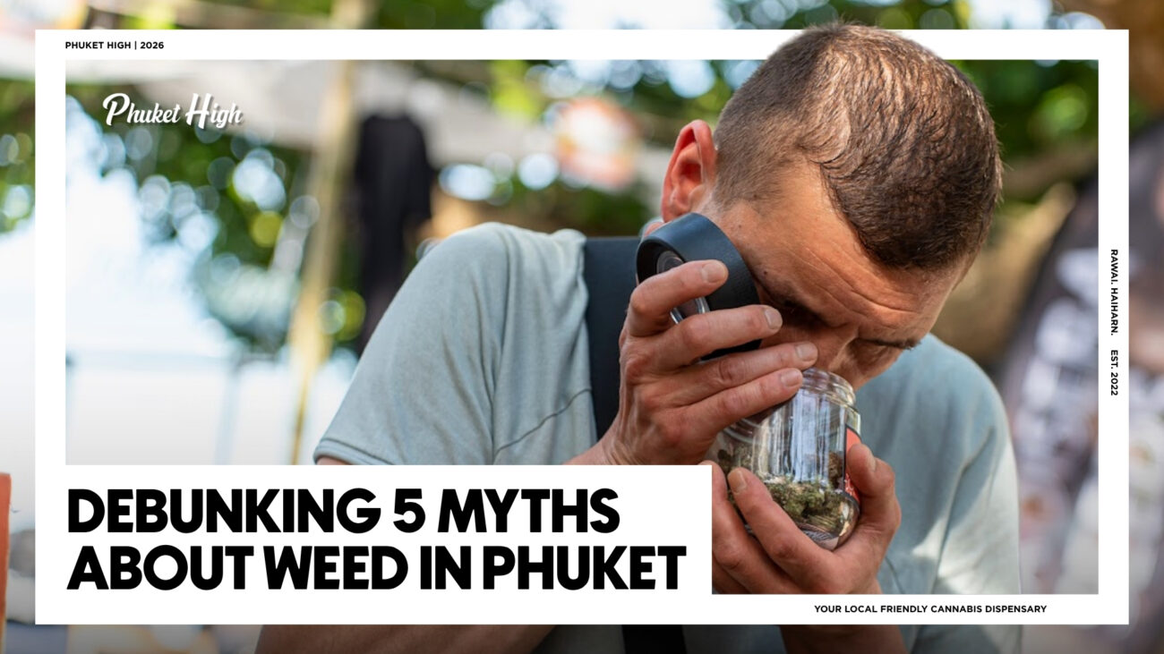 A man using a magnifying glass to inspect a jar of high-quality Weed in Phuket at Phuket High dispensary.