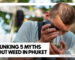 A man using a magnifying glass to inspect a jar of high-quality Weed in Phuket at Phuket High dispensary.