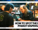 HOW TO SPOT THE BEST PHUKET DISPENSARY - A Phuket High dispensary staff member assisting a customer inside a warm, well-lit cannabis shop.