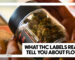 WHAT THC LABELS REALLY TELL YOU ABOUT FLOWER - A close-up of a person's hands holding a clear glass jar filled with cannabis flower alongside a printed label.
