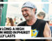 HOW LONG A HIGH FROM WEED IN PHUKET REALLY LASTS - A man wearing a white patterned bandana and a black sleeveless shirt laughing heartily outdoors at a bustling daytime event.