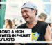 HOW LONG A HIGH FROM WEED IN PHUKET REALLY LASTS - A man wearing a white patterned bandana and a black sleeveless shirt laughing heartily outdoors at a bustling daytime event.